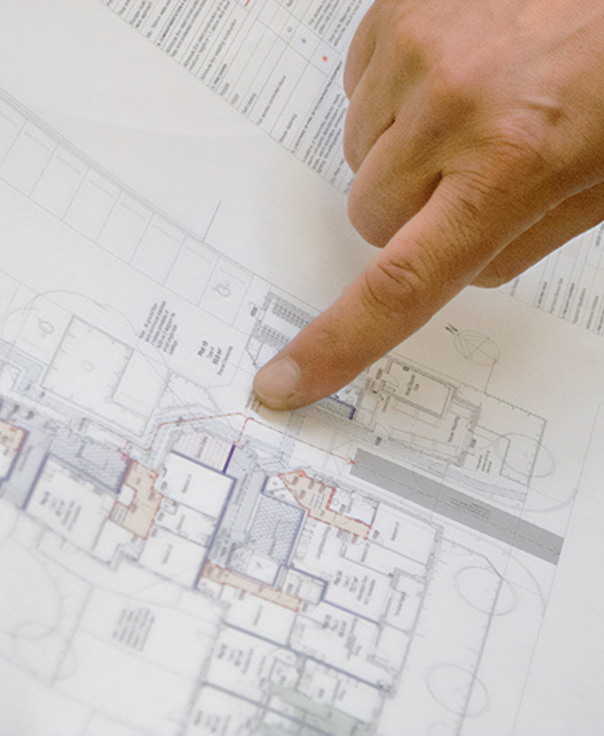 Image showcasing two peoplle performing a fire risk assesment.